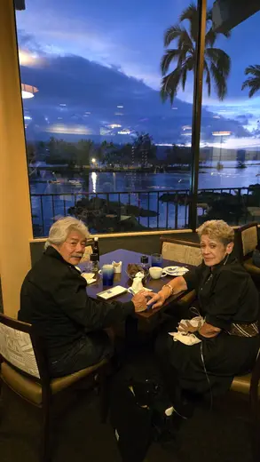Couple enjoying a meal with a view at Hawaii Wellness Clinic, a detox center in Hawaii.
