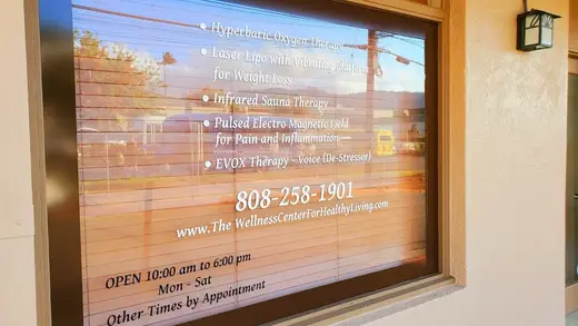 Window display with therapy services at The Wellness Center for Healthy Living, Inc., a detox center in Hawaii.